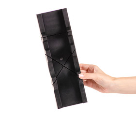 Plastic black miterbox on white background isolation