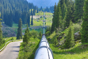water pipeline in the mountains - obrazy, fototapety, plakaty
