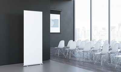 Blank white roll up next to meeting room in modern office, 3d rendering