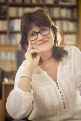 portrait of woman in her studio, half body shot