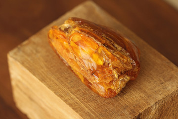 Amber raw unprocessed natural mineral stone amber, a collection of natural stones on a background...