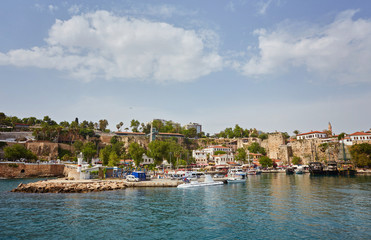 Aerial view of yacht harbor and red house roofs in Old town timelapse Antalya, Turkey.