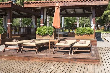 Sun loungers with a towel on the beach.