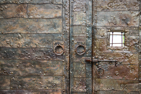 Close-up of metal massive door in an ancient fortress Gonio, Georgia