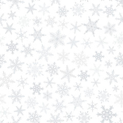 Christmas seamless pattern of snowflakes, gray on white background.
