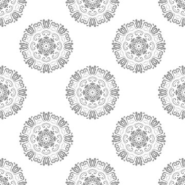 Floral round light ornament. Seamless abstract classic background with flowers. Pattern with repeating elements