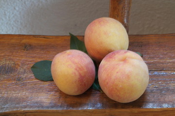 ripe peaches, just ripped from the tree