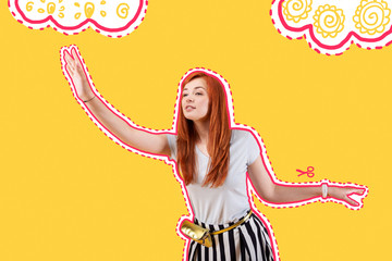 Attractive model. Emotional professional model looking into the distance and putting her hand up while posing for a photo