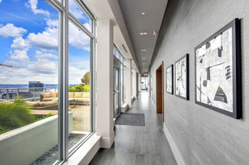 Condo hall interior with luxurious deck overlooking Seattle.