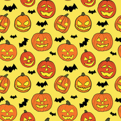 Halloween seamless vector pattern with hand drawn orange pumpkins carved faces and black bats on yellow background.
