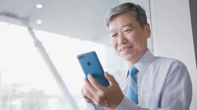 old businessman use phone