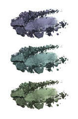 Set of eyeshadow sample isolated on white background. Crushed blue and green metallic eyeshadow. Closeup of a makeup product