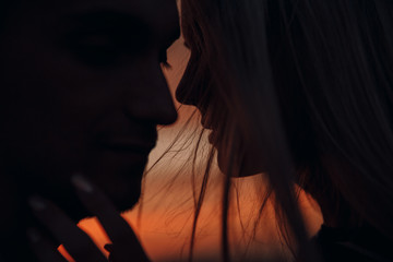 Loving couple.Together.Couple at sunset.Sunset.Love.Feeling.Tenderness.Silhouette photo