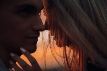 Loving couple.Together.Couple at sunset.Sunset.Love.Feeling.Tenderness.Silhouette photo