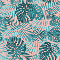 Tropical leaf design featuring teal green palm and Monstera plant leaves on a pink background. Seamless vector repeating pattern. - 214010844