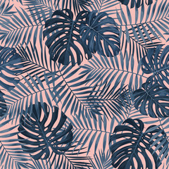 Tropical leaf design featuring navy blue palm and Monstera plant leaves on a pink background. Seamless vector repeating pattern. - 214010845
