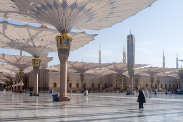 MEDINA, SAUDI ARABIA - APRIL 28 2018: These Umbrella construction on the square of Al-Masjid...