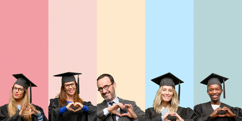 Senior teacher with his graduate students happy showing love with hands in heart shape expressing...