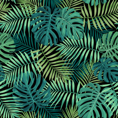 Tropical leaf design featuring green palm and Monstera plant leaves on a black background. Seamless vector repeating pattern. - 214016235