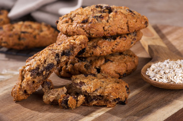 Stack of Oatmeal Raisin Cookies on a Wooden Board