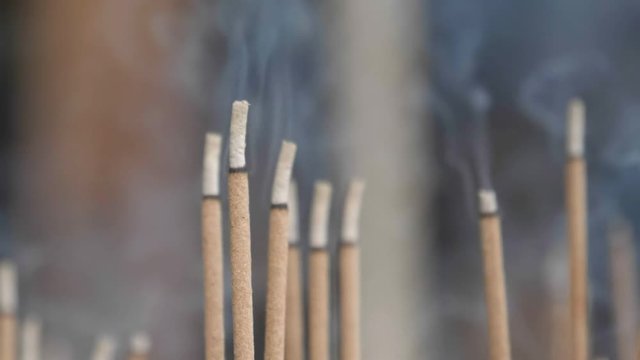 slow motion clip of incense smoke at a temple in kyoto, japan- originally recorded at 180p