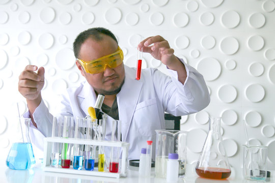 Scientists experiment in laboratory science.