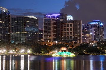 Fototapeta na wymiar Downtown Orlando skyscrapers from Lake Eola at night