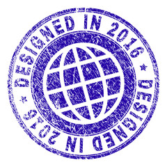 DESIGNED IN 2016 stamp watermark with distress texture. Blue vector rubber print of DESIGNED IN 2016 caption with dirty texture. Seal has words arranged by circle and planet symbol.