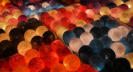 Colorful and glowing balls are sold at Alexanderplatz Christmas Market