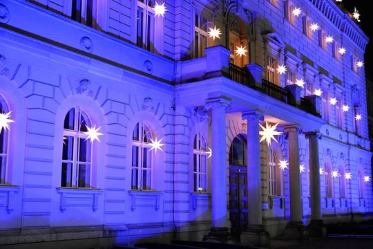 Alte Kommandantur building illuminated at night