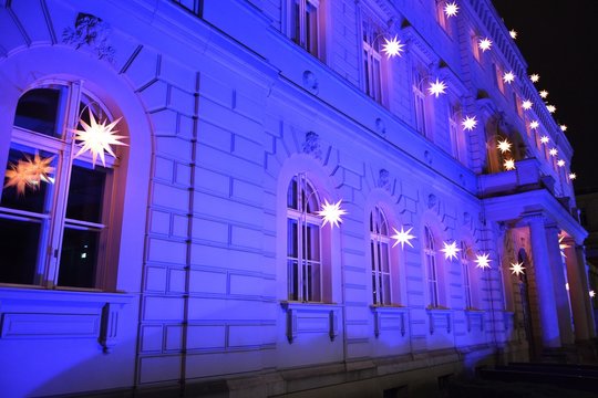 Alte Kommandantur building illuminated at night
