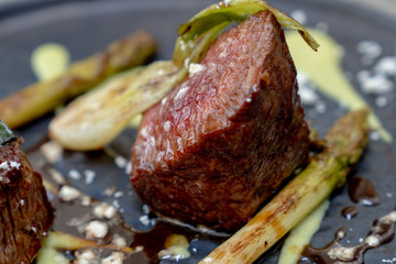 filet mignon plated with Brussels sprouts