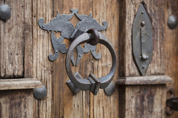 An ancient door handle in the door of the Church of the Blessed Virgin Mary  "na Piascu" 