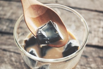 Coffee jelly on wood background