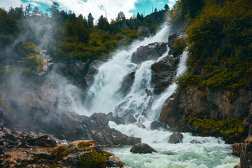 Naklejka na ściany i meble Rutor Waterfall in forest of Valle D'Aosta