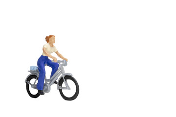 Fototapeta na wymiar Miniature people travellers with bicycle isolate on white background with clipping path 