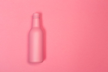 Flat lay of Celebration. Beer bottle