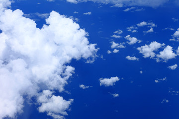 Obraz premium white fluffy clouds in the blue sky
