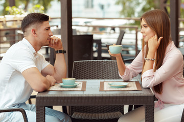 Two people in cafe enjoying the time spending with each other