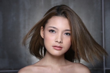 Fototapeta premium Fashion Asian Woman with Update style and make up Hairstyle