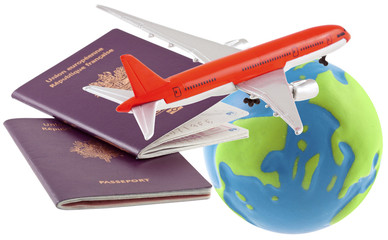 Fototapeta na wymiar avion sur passeport et globe, concept voyages 