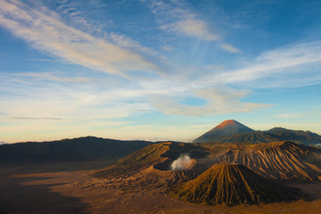 Fototapeta na wymiar Bromo volcano at sunrise,Tengger Semeru National Park, East Java, Indonesia,Bird eye view. Morning sunrise in bromo mountain.