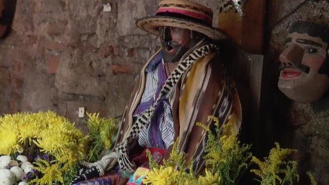 Guatemala deity Maximon in an alter in Antigua, Guatemala.