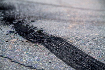 burnt rubber traces on asphalt