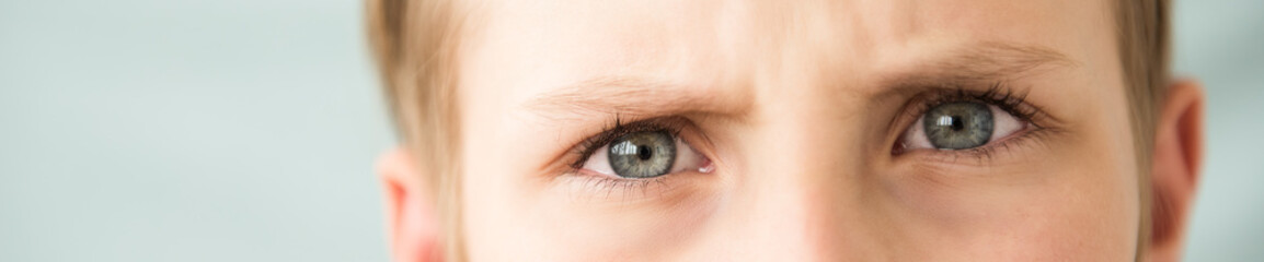 Obraz premium Site header. Sad boy with expressive eyes. Depression, anxiety, frustration and anxiety concept