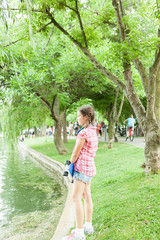 Girl having fun in the park  with her skate 