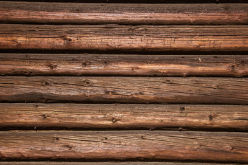 The wooden wall of a village house.