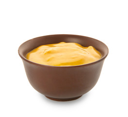 Bowl with curry sauce on white background