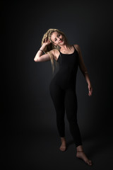 Blonde young woman dancing dancehall