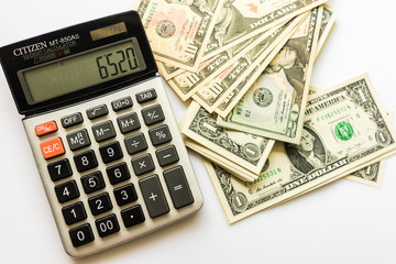 Close-up  Money and Calculator, American Dollar Banknotes